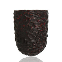 a close up of the bowl showing deep rustication