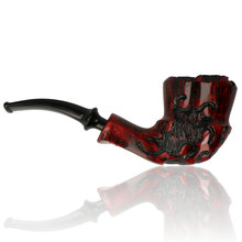 Handmade Danish freehand pipe featuring dramatic crimson stain, carved fantasy details and plateau rim